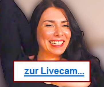 Camgirl Ladymilfi lacht auf Deutsch.